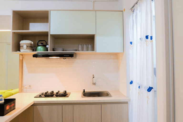 Well Furnished 2BR Bassura City Apartment By Travelio, East Jakarta