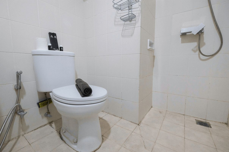 Bathroom 1, 2BR with Sofa Bed Cervino Village Casablanca Apartment By Travelio, South Jakarta