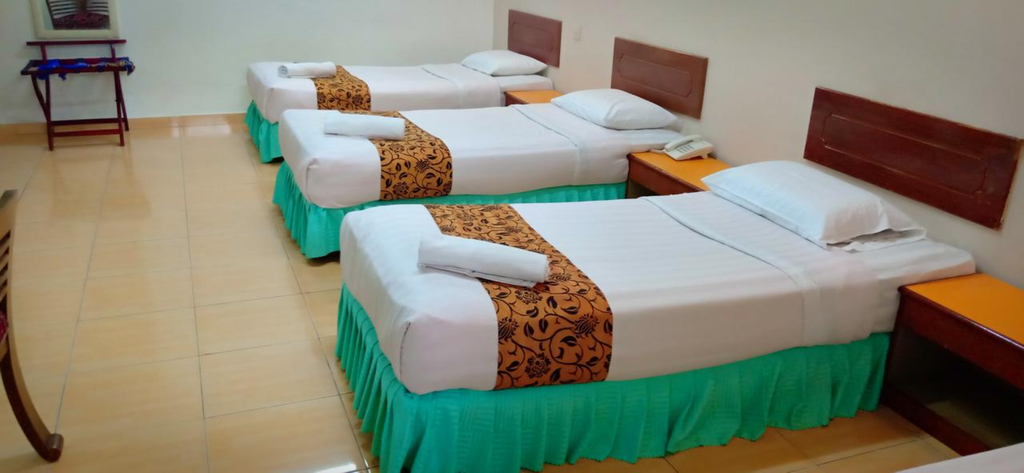 Hotel KT Mutiara - Tap to explore photos