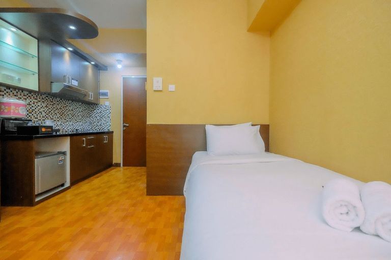 Bedroom 1, Comfortable Studio Apartment at Taman Melati near Universitas Indonesia By Travelio, Depok