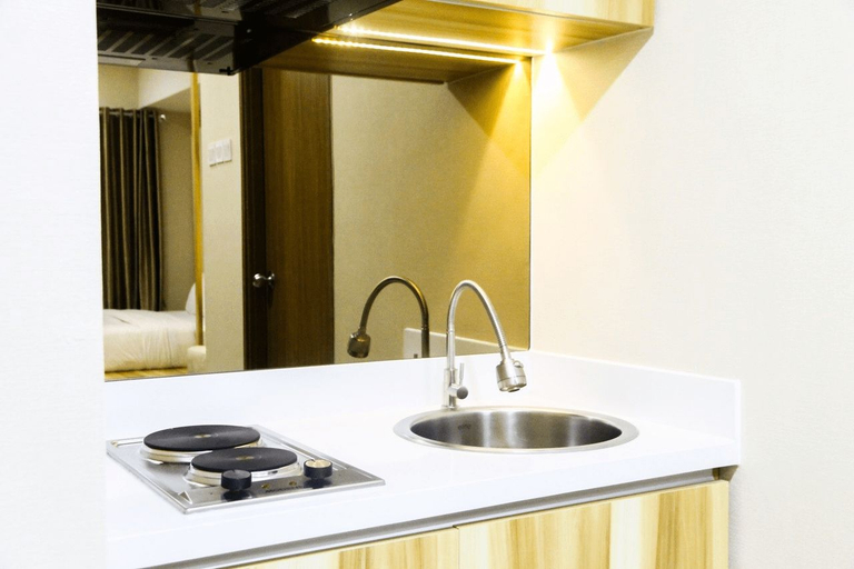 Others 4, Modern Style The Oasis Studio Apartment with Comfortable Sofa By Travelio, Cikarang
