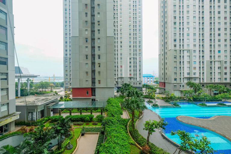 Elegant Studio (No Kitchen) Apartment at Green Bay Pluit By Travelio, North Jakarta