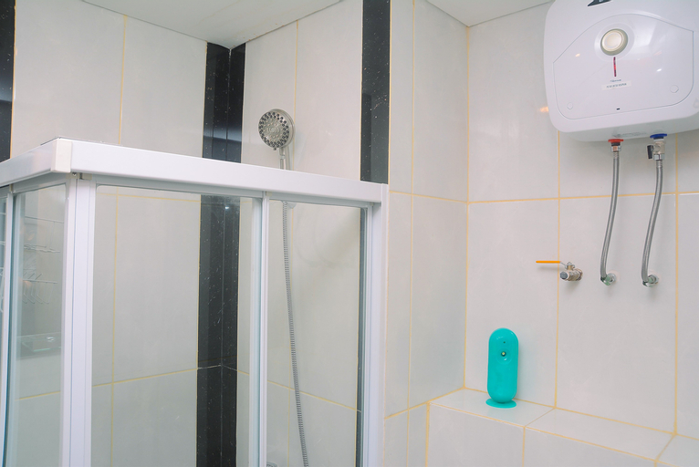 Bedroom 3, Cozy and Simple Living 1BR Grand Kamala Lagoon Apartment By Travelio, Bekasi