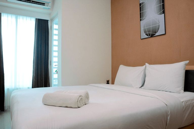 Minimalist and Homey 1BR Grand Kamala Lagoon Apartment By Travelio, Bekasi