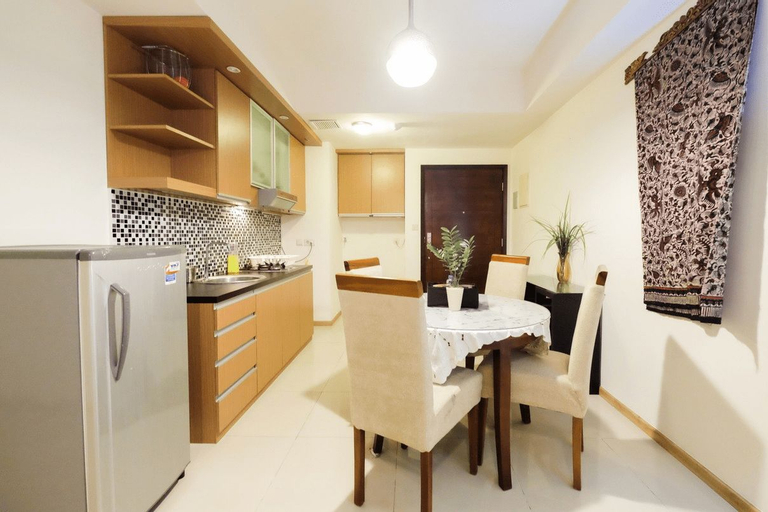 Dining Room 4, Homey 2BR Apartment @ Casa Grande Residence By Travelio, South Jakarta