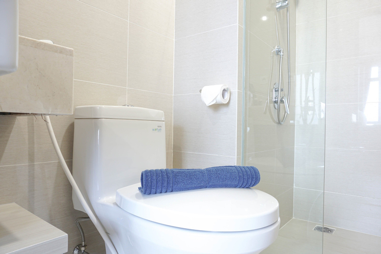 Simple and Minimalist 3BR Apartment at Puri Mansion By Travelio, West Jakarta