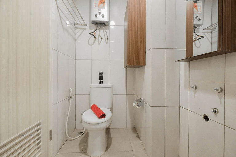 Bedroom 3, Cozy Studio Apartment at Grand Kamala Lagoon By Travelio, Bekasi