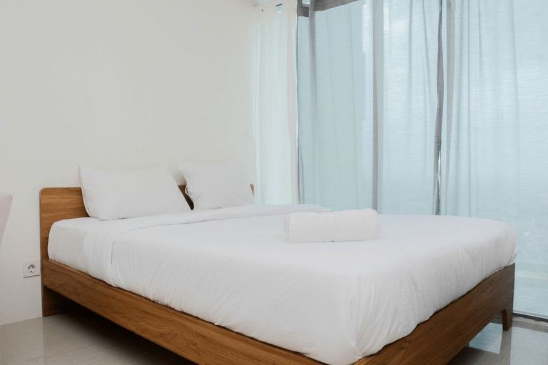 Bedroom 1, Comfy and Warm Studio Grand Kamala Lagoon Apartment By Travelio, Bekasi