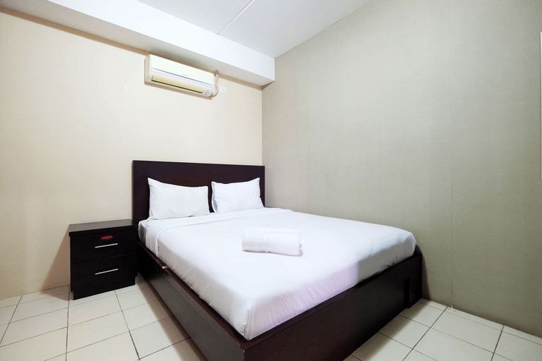 Bedroom 1, Elegant and Spacious 2BR Metropark Condominium Jababeka Apartment By Travelio, Cikarang