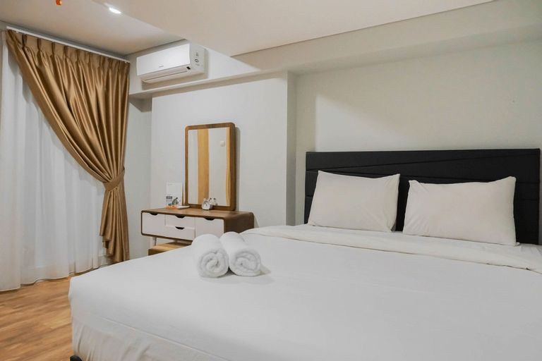 Modern 2BR Apartment at Maqna Residence By Travelio, West Jakarta