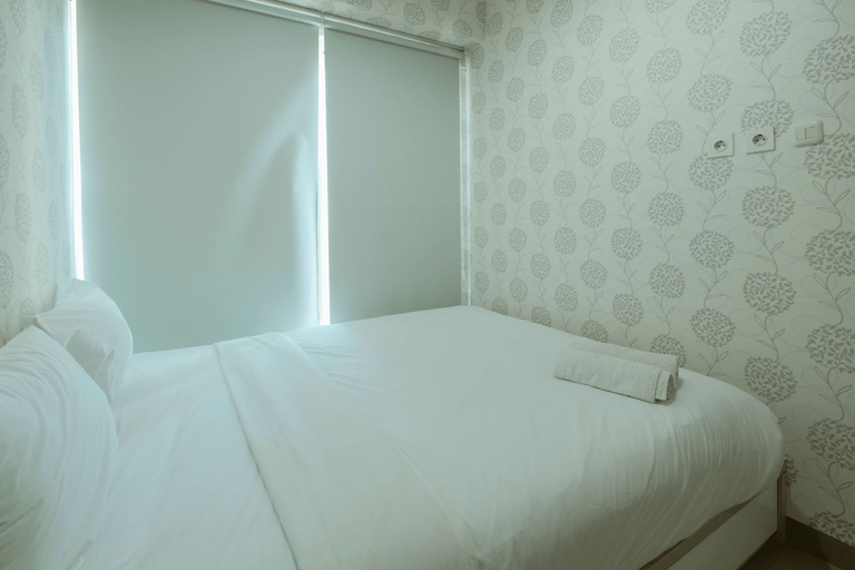 Bedroom 3, Comfy and Modern 2BR Apartment at Grand Kamala Lagoon By Travelio, Bekasi