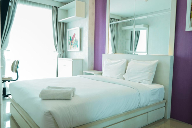 Bedroom 1, City View 1BR Apartment at Woodland Park Residence By Travelio, Jakarta Selatan