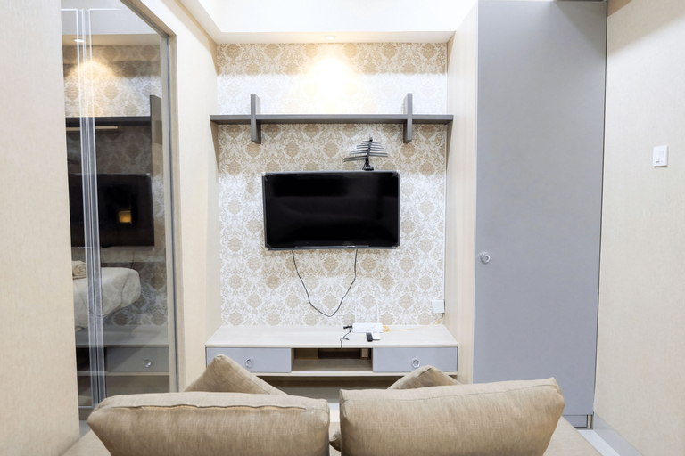 Modern 1BR Oasis Cikarang Apartment By Travelio, Cikarang