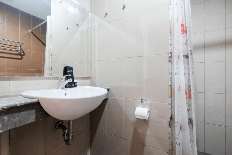 Bedroom 3, Warm and Homey 1BR Apartment at Atlanta Residences By Travelio, Depok