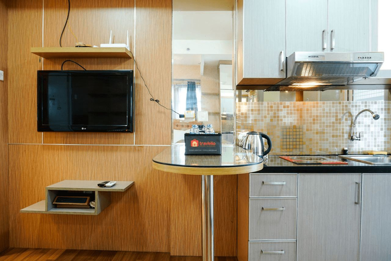 Furnished Studio with Comfortable Design Green Pramuka Apartment By Travelio, Central Jakarta