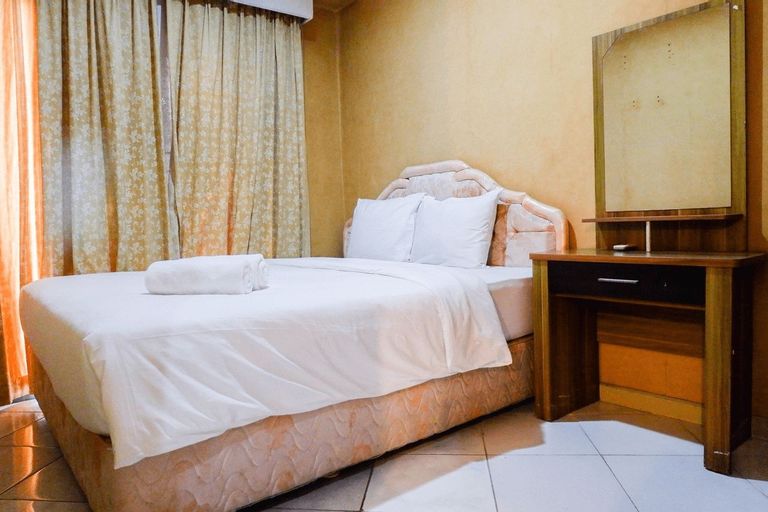 Bedroom 1, Spacious 1BR Apartment at Taman Beverly By Travelio, Surabaya
