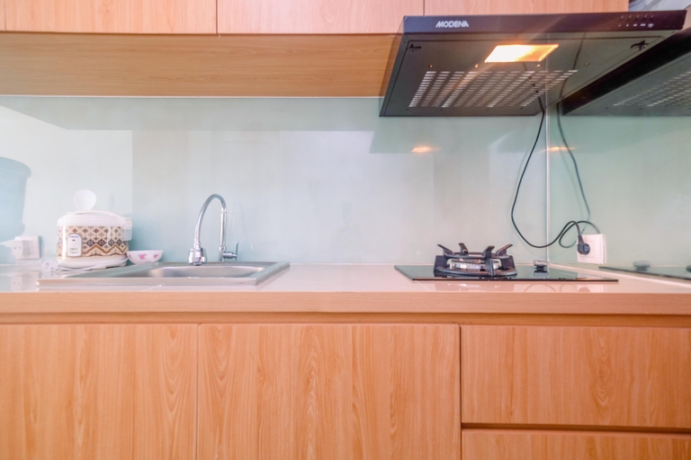 Public Area, Modern Style Studio Tamansari Mahogany Apartment with City View By Travelio, Karawang