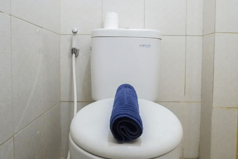 Bathroom 3, Comfy and Clean Studio Room Apartment at Educity By Travelio, Surabaya