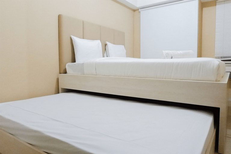 Bedroom 2, Cozy Studio Apartment at Orchard Supermall Mansion By Travelio, Surabaya