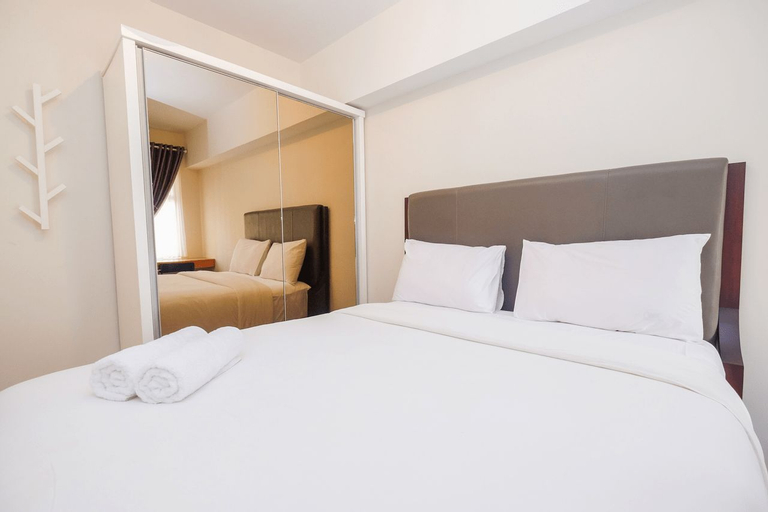 Pool View and Homey 2BR Apartment @ Springlake Summarecon By Travelio, Bekasi