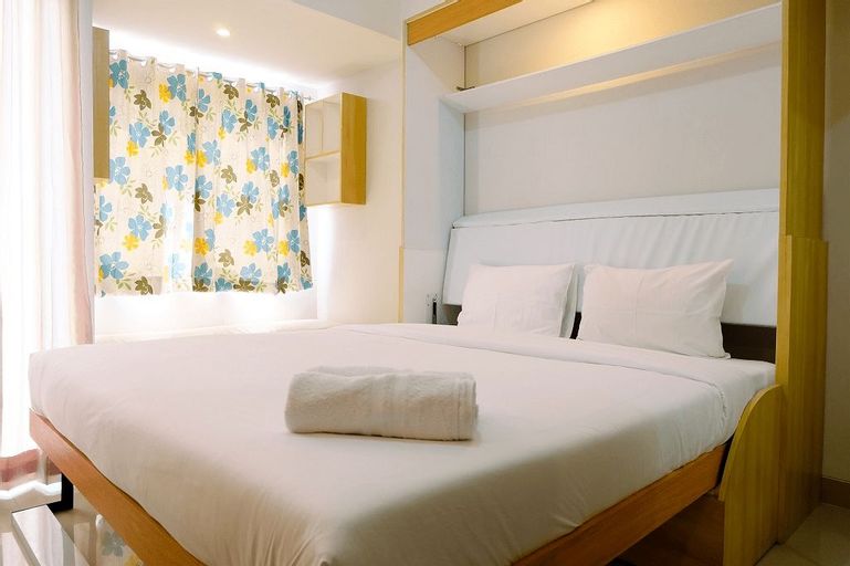 Bedroom 1, Comfortable and Clean Studio at The Oasis Apartment By Travelio, Cikarang