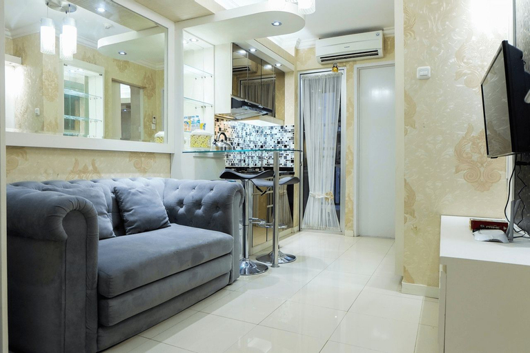 Public Area 5, Compact 2BR Bassura City Apartment By Travelio, East Jakarta