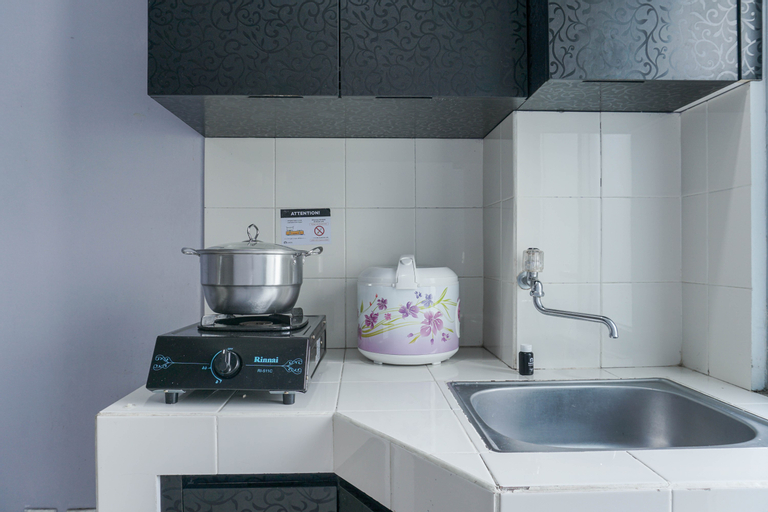 Comfy and Modern 2BR Seasons City Apartment with City View By Travelio, West Jakarta