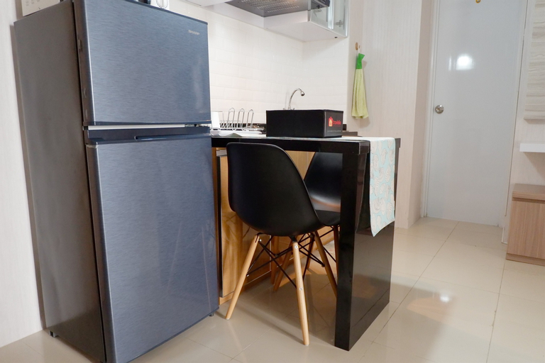 Comfort 1BR Apartment with Sofa Bed connected to Mall Bassura City By Travelio, East Jakarta