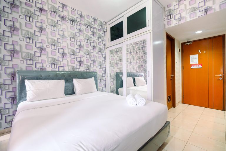 Bedroom 1, Warm and Cozy @ Studio Margonda Residence 5 Apartment By Travelio, Depok