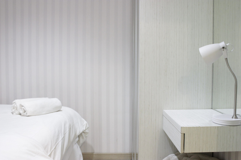 Bedroom 2, Pleasant and Homey 2BR Apartment at Tamansari La Grande By Travelio, Bandung