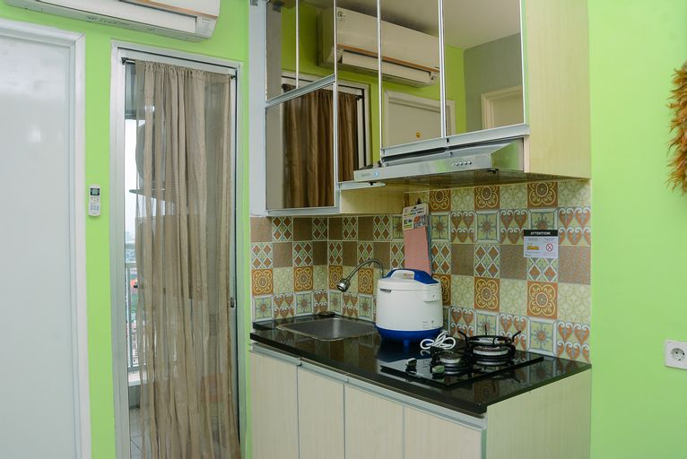 Comfortable 2BR Bassura City Apartment near Bassura Mall By Travelio, East Jakarta