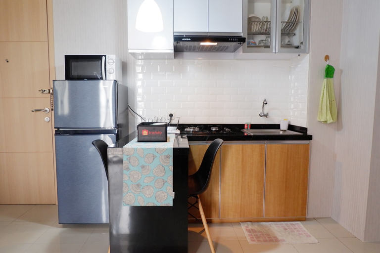 Comfort 1BR Apartment with Sofa Bed connected to Mall Bassura City By Travelio, East Jakarta