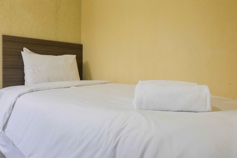 Simply Warm 2BR Green Palace Apartment By Travelio, South Jakarta