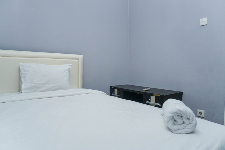 Comfy and Modern 2BR Seasons City Apartment with City View By Travelio, West Jakarta