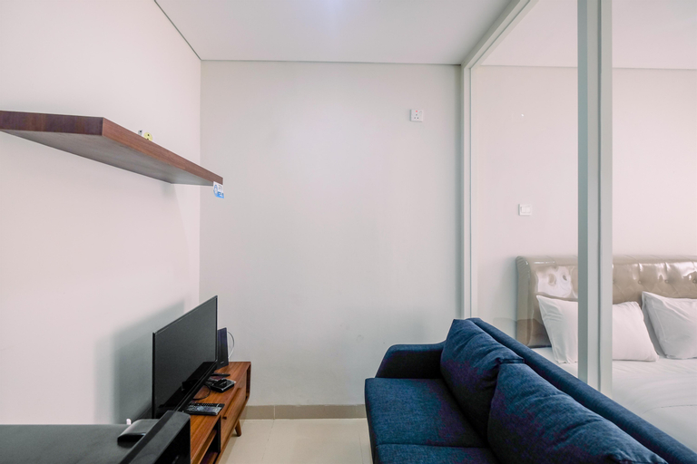 Elegant with Modern Design 1BR Apartment at Atlanta Residences By Travelio, Depok