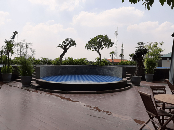 Modern Studio with City View Parkland Avenue Apartment By Travelio, South Tangerang