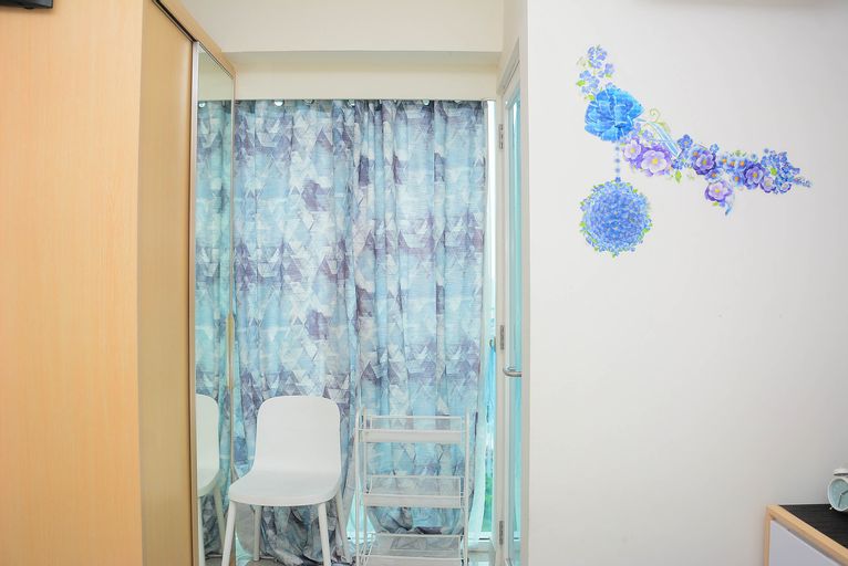 Exterior & Views, Cozy Stay 1BR at Grand Kamala Lagoon Apartment By Travelio, Bekasi