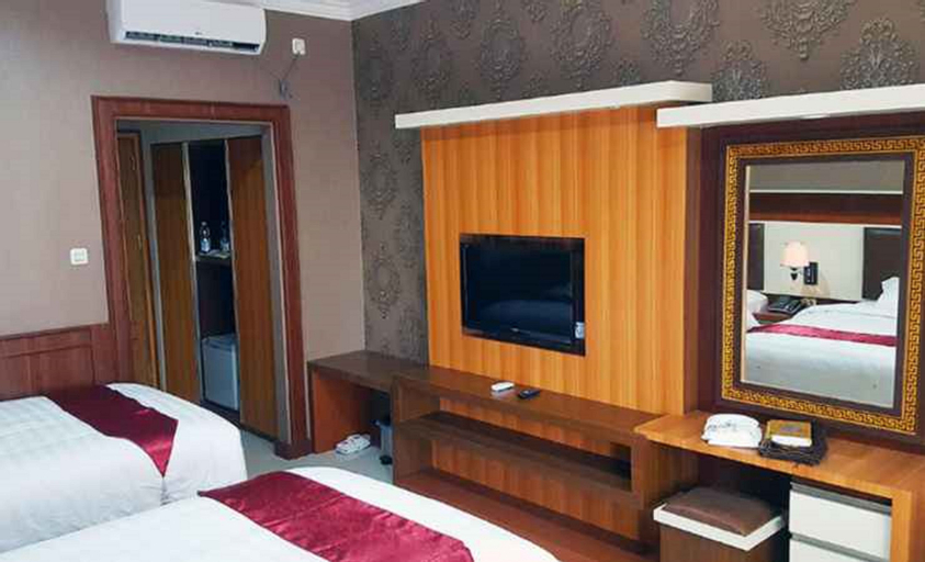 Hotel Sakura Syariah - Tap to explore photos