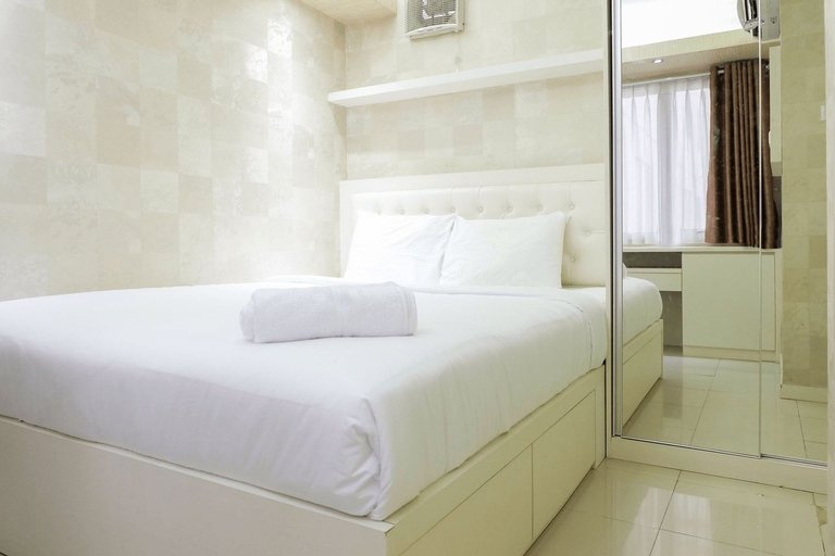 Bedroom 1, Compact 2BR Bassura City Apartment By Travelio, East Jakarta