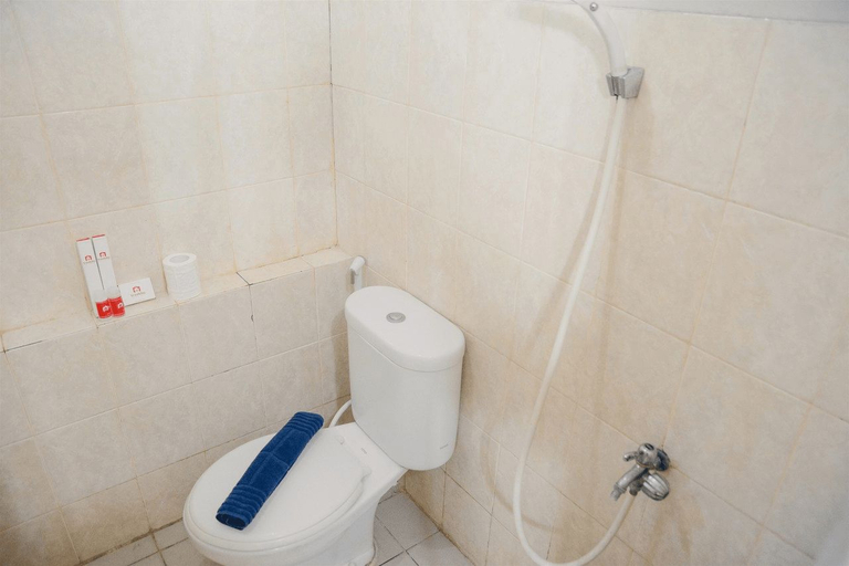 Bathroom 5, 2BR Grand Emerald Apartment By Travelio, North Jakarta