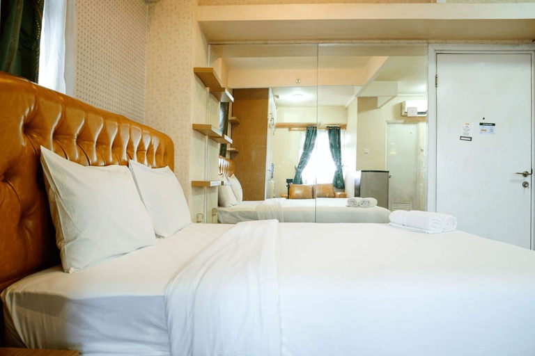 Bedroom 5, Furnished Studio with Comfortable Design Green Pramuka Apartment By Travelio, Central Jakarta