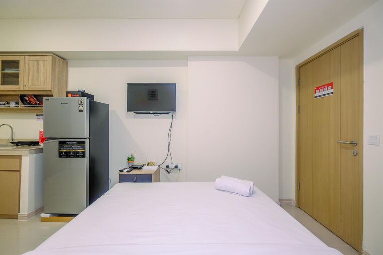 Bedroom 2, Comfort and Strategic Studio Meikarta Apartment By Travelio, Cikarang