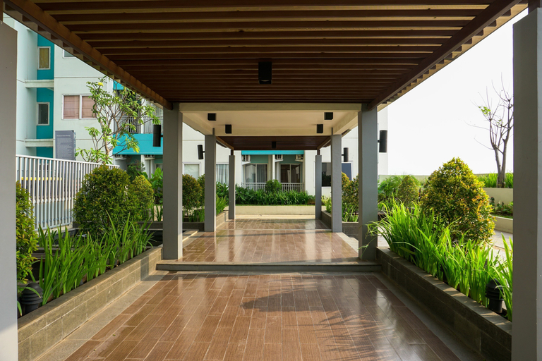 Exterior & Views, Chic and Cozy 2BR The Nest Puri Apartment By Travelio, Tangerang