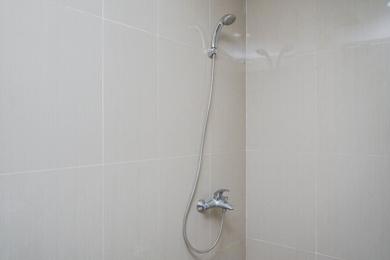 Bathroom 5, Simply Strategic and Comfy Studio Paramount Skyline Apartment By Travelio, Tangerang