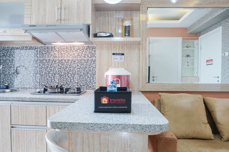 Homey and Fresh 2BR Green Pramuka Apartment By Travelio, Central Jakarta