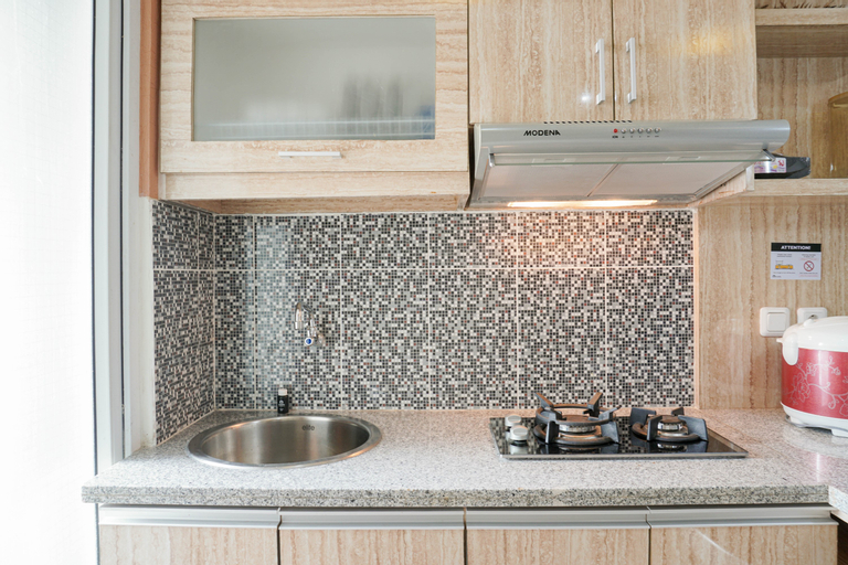 Homey and Fresh 2BR Green Pramuka Apartment By Travelio, Central Jakarta