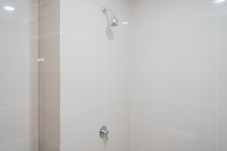 Bathroom 3, Comfy Studio Apartment at B Residence By Travelio, Tangerang Selatan
