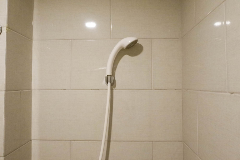 Bathroom 5, Best Value Best Studio Benson Apartment Connected to Pakuwon Mall By Travelio, Surabaya