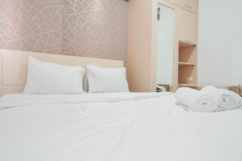 Bedroom 1, Cozy Stay at 2BR Green Pramuka Apartment near Shopping Center By Travelio, Central Jakarta