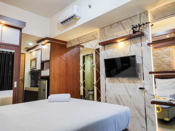 Bedroom 2, Homey and Comfy Studio at Vida View Makassar Apartment By Travelio, Makassar